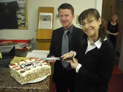 Pauline McGlynn cutting the cake at Castlecomer Library 10th Birthday celebrations